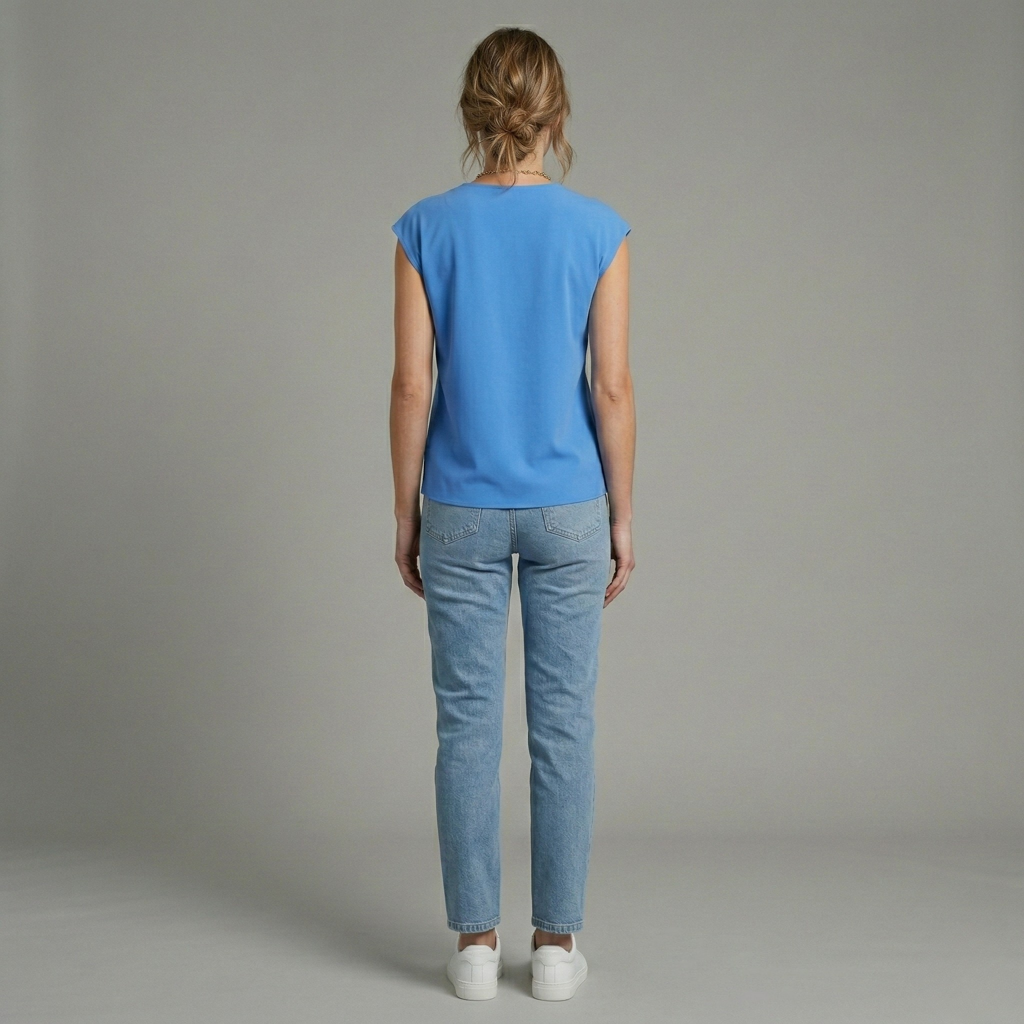 Blusa casual de mujer con escote en V y manga corta tipo capa