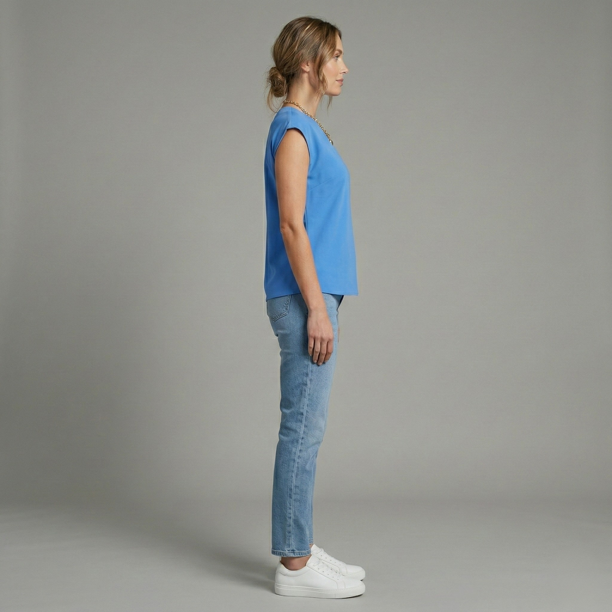 Blusa casual de mujer con escote en V y manga corta tipo capa